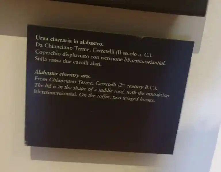 Four-point cross on an alabaster cinerary urn